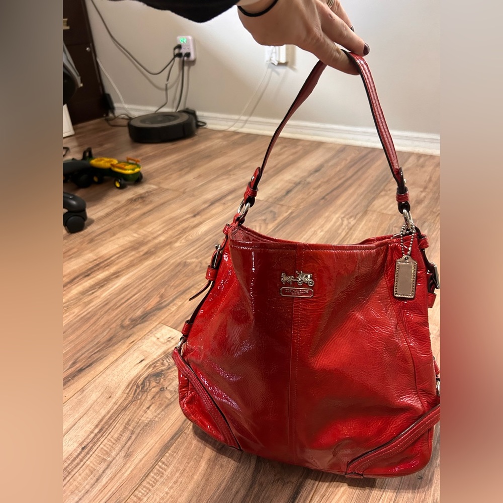 Chelsea red patent leather handbag by Coach